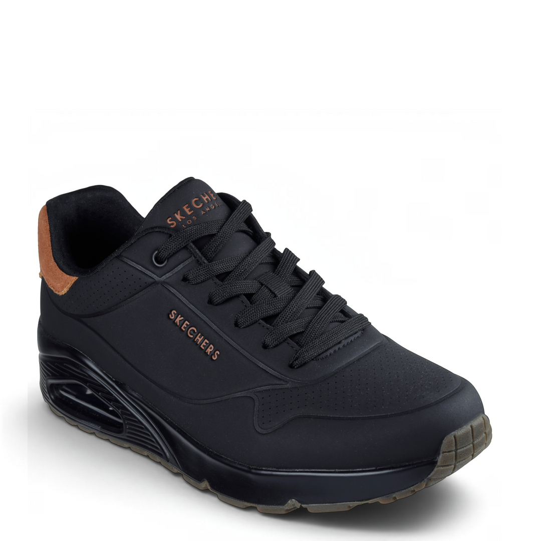 ada-shoes.ro Skechers Uno Suited black sneakers with Durabuck upper, suede heel detail, and visible air-cushion sole.