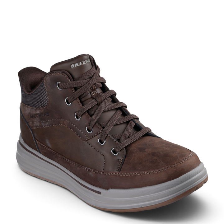 ada-shoes.ro Skechers Sterling Rogan brown leather casual mid-top boots with slip-in design and memory foam sole.