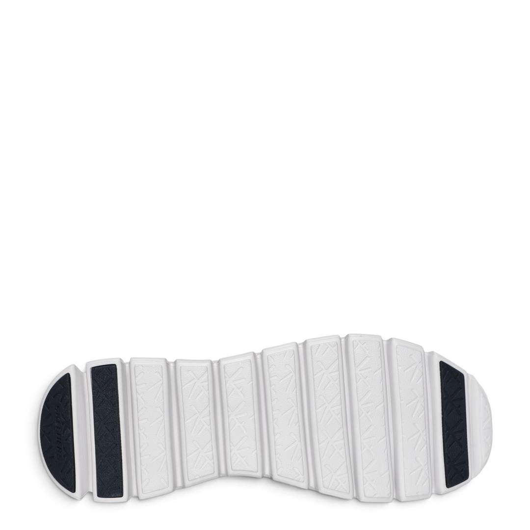ada-shoes.ro Skechers Glide-Step Sylo navy sneaker outsole showing white flexible tread and black traction pads