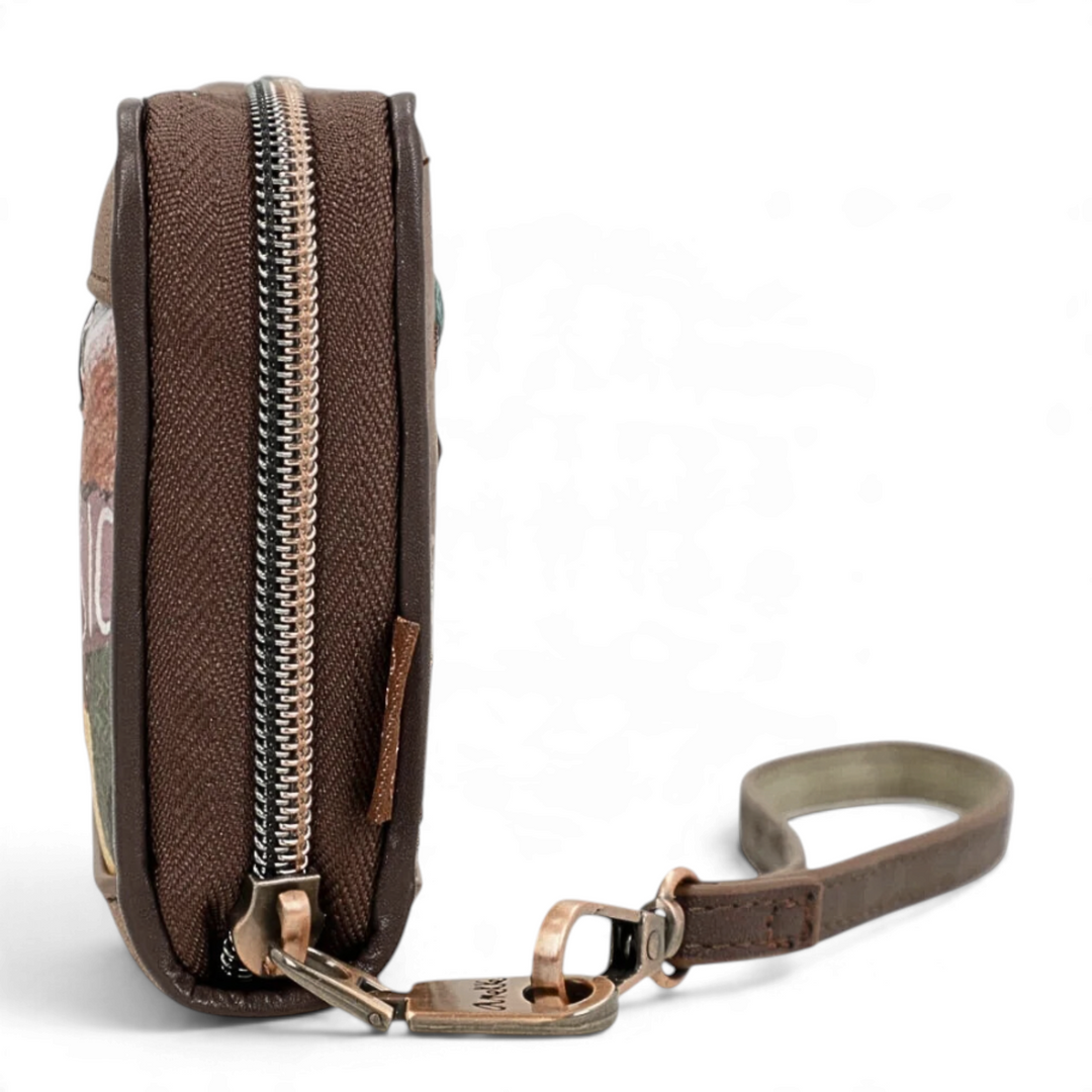 Side view of an ada-shoes.ro Anekke clutch wallet in brown faux leather with a detachable wrist strap and zipper.