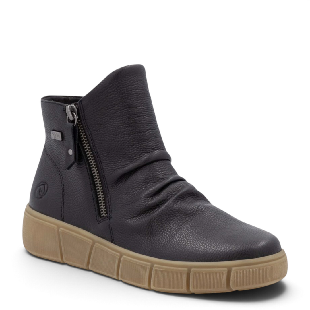 ada-shoes.ro Remonte black leather ankle boots with slouchy design, side zippers, and a thick caramel rubber sole.