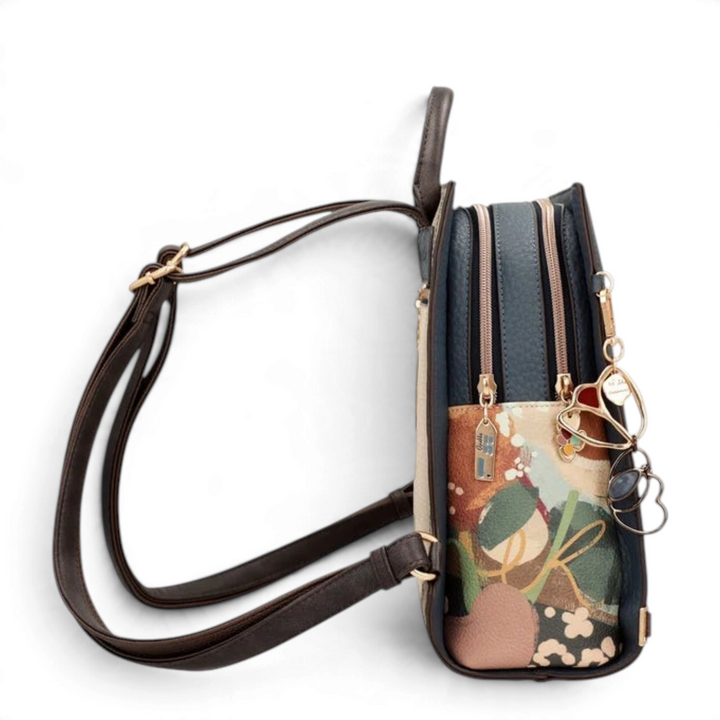 ada-shoes.ro Anekke Bloom collection backpack in side view, featuring dual zippered compartments and decorative charms.
