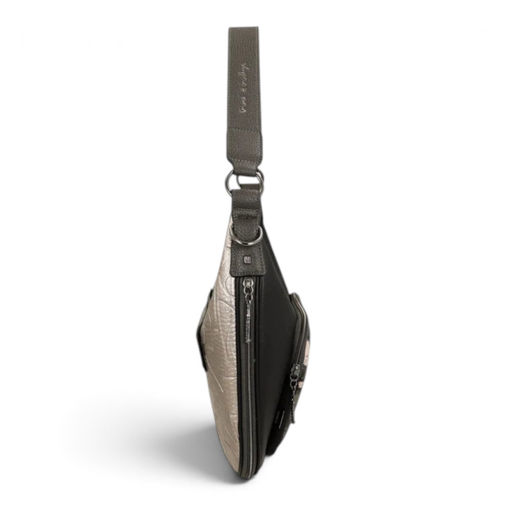 ada-shoes.ro Anekke hobo shoulder bag in black and metallic silver faux leather with a side view profile