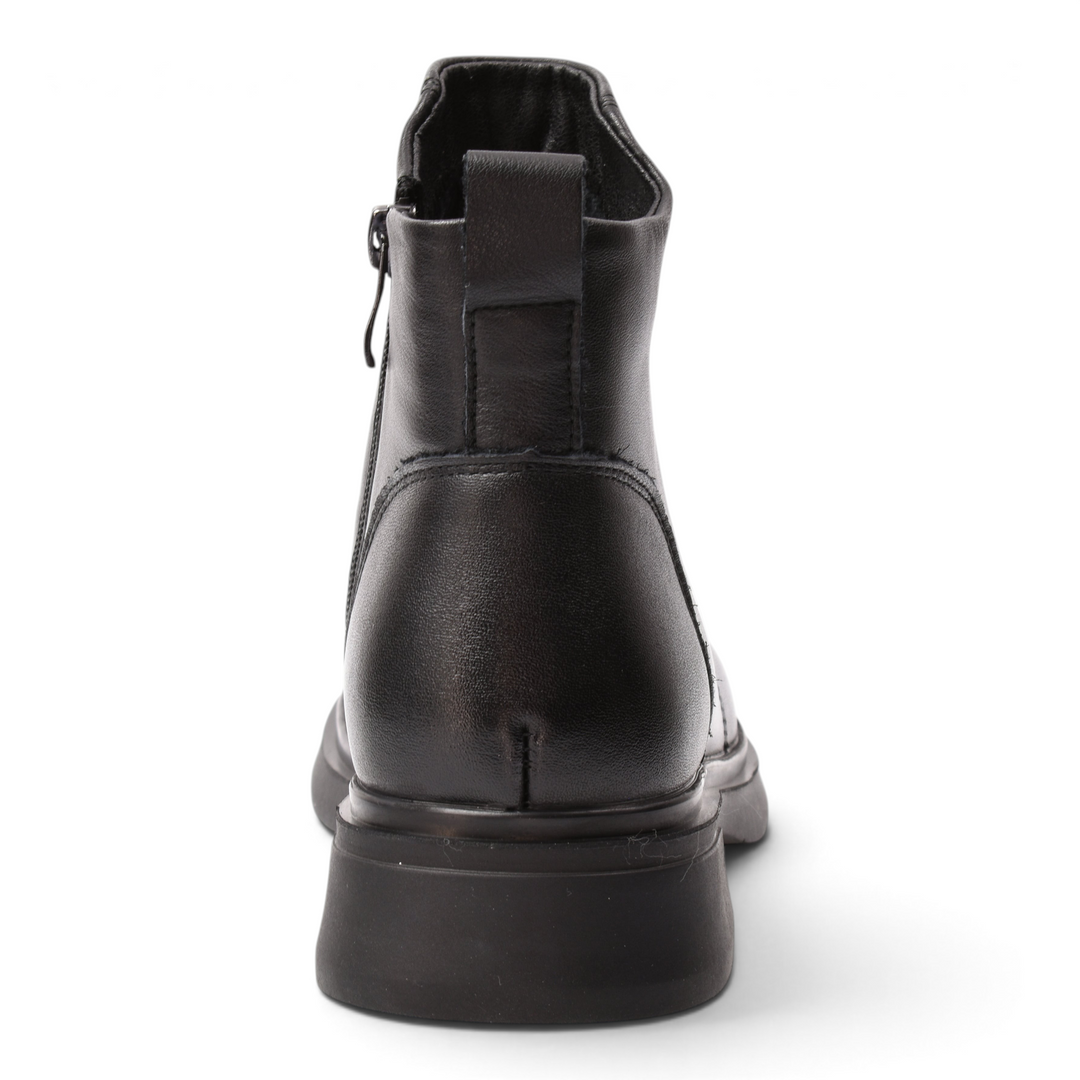 Back view of black leather ankle boots from ada-shoes.ro featuring a side zipper and a thick rubber sole