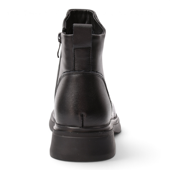 Back view of black leather ankle boots from ada-shoes.ro featuring a side zipper and a thick rubber sole