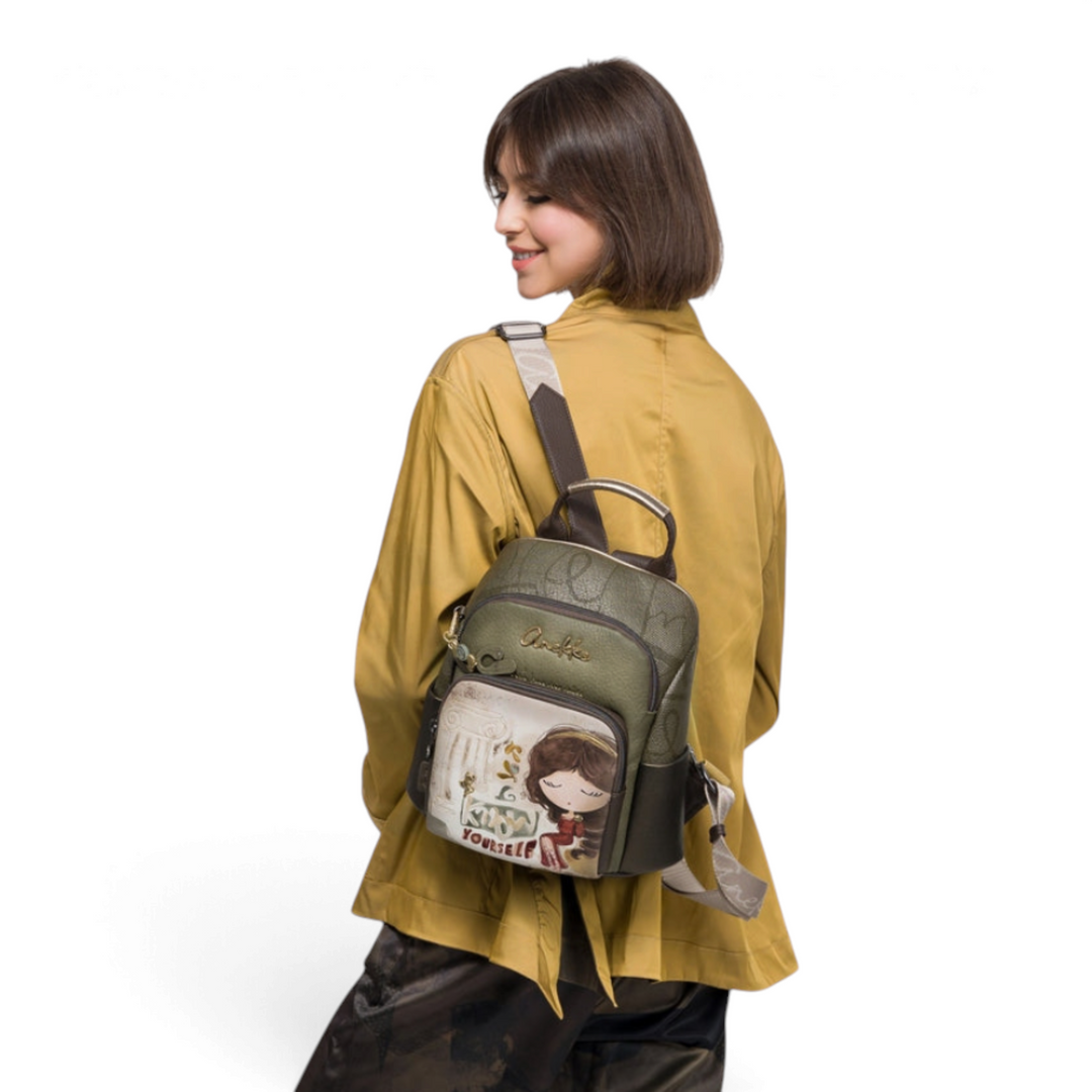 Woman wearing an olive green Anekke backpack with embossed texture and illustrated front pocket from ada-shoes.ro