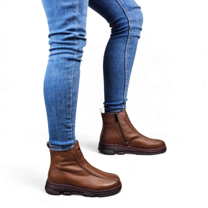 ada-shoes.ro brown leather casual ankle boots with side zipper and stitched sole worn with blue jeans