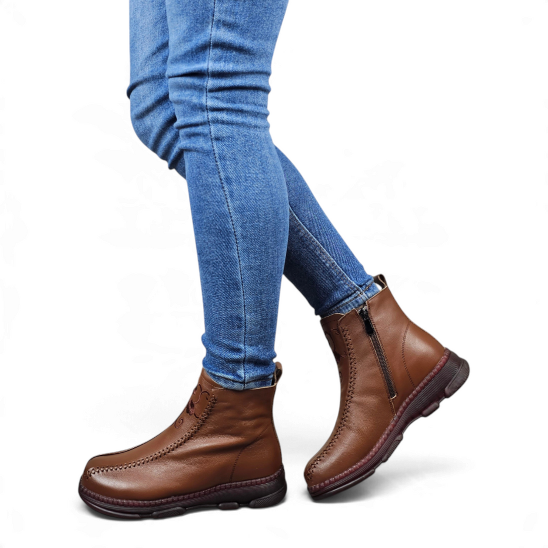 ada-shoes.ro Formazione brown leather casual ankle boots with side zipper and stitched sole on a model in blue jeans