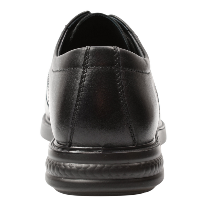 Rear view of black leather Goretti formal shoes from ada-shoes.ro featuring a durable textured sole and stitching.