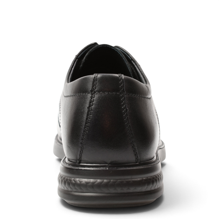 Rear view of black leather Goretti formal shoes from ada-shoes.ro featuring a durable textured sole and stitching.