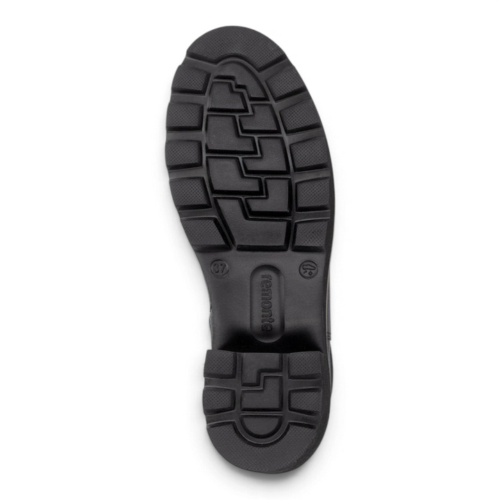 Black lugged rubber outsole of a Remonte boot from ada-shoes.ro, showing tread pattern and block heel detail.