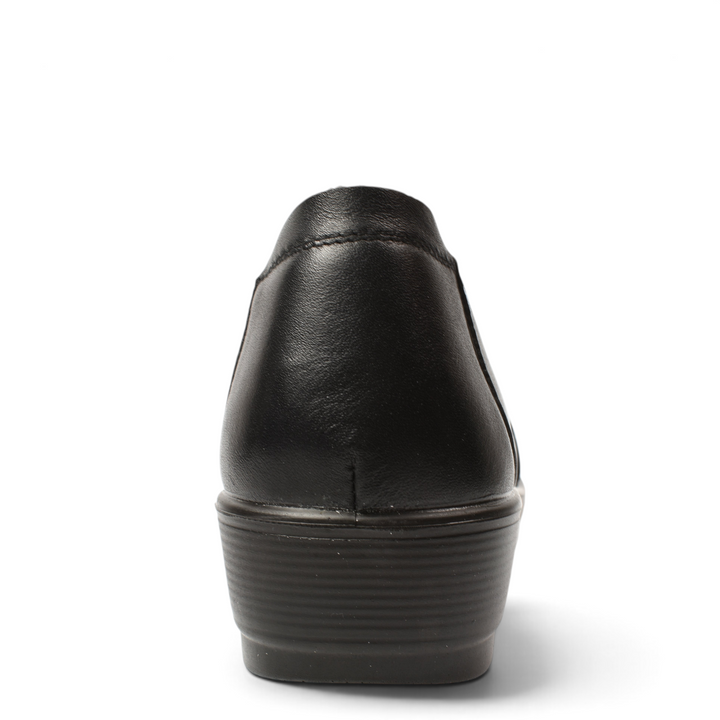 Rear view of black leather casual shoes from ada-shoes.ro with a comfortable low wedge sole
