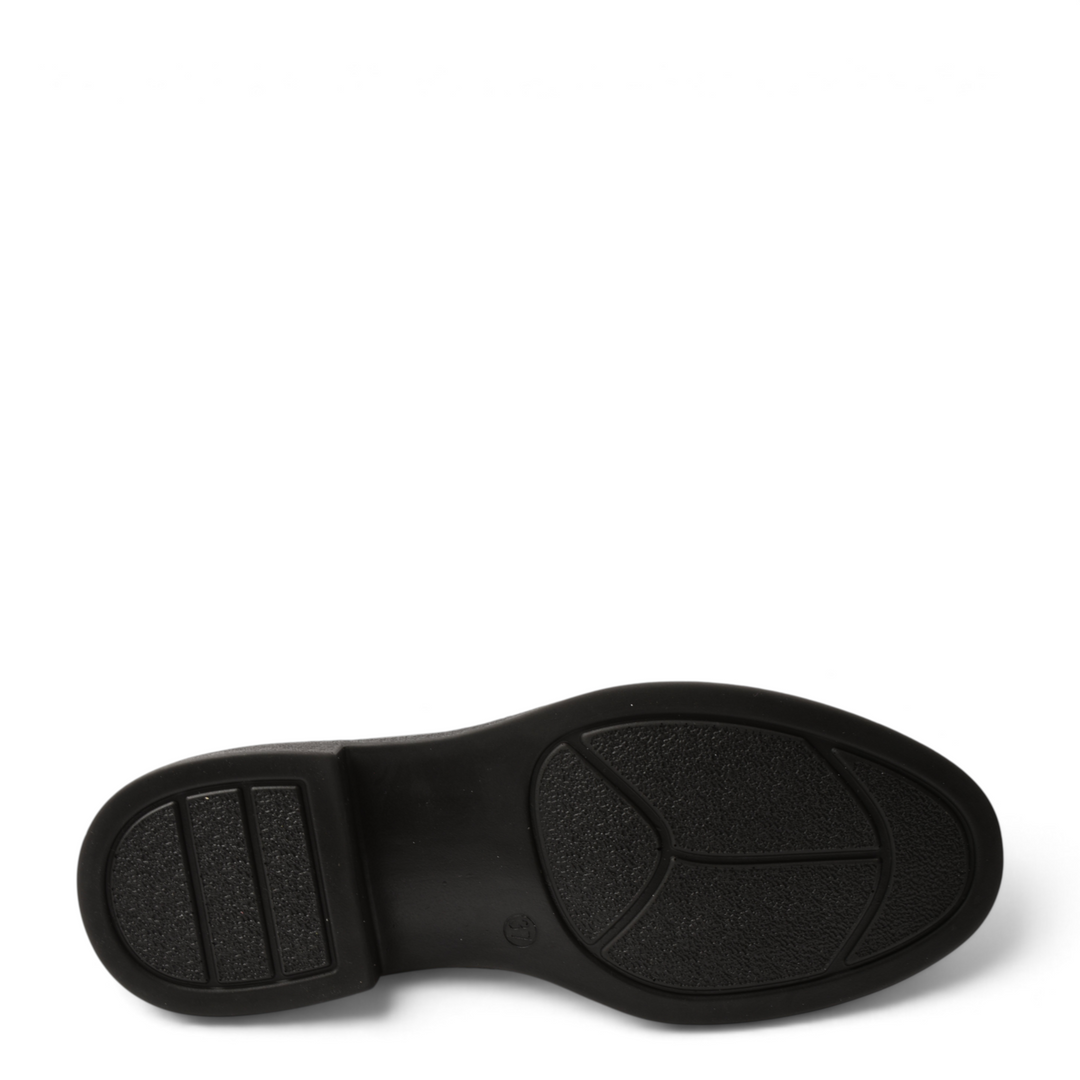 Black rubber sole of ada-shoes.ro ankle boots with a low block heel and textured grip pattern