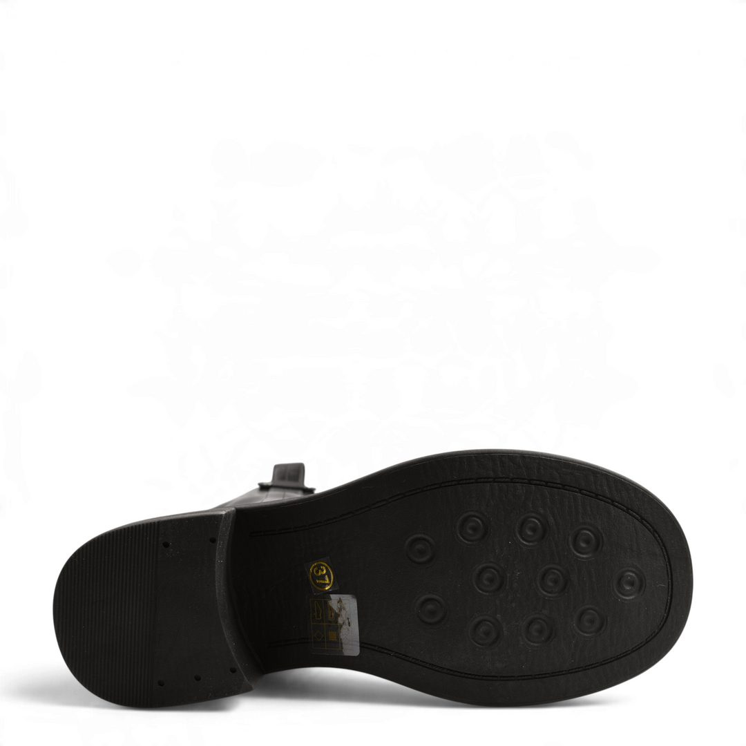 Black sole of Pass Collection casual boots with a 4cm block heel and textured tread pattern for grip
