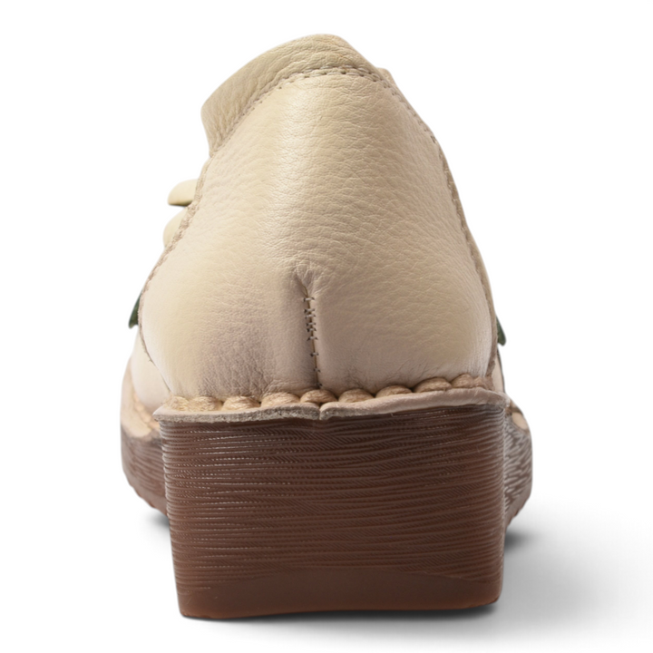 ada-shoes.ro cream leather casual shoes with a brown wedge sole, back view showing textured heel and stitching.