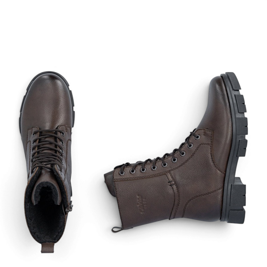 ada-shoes.ro Rieker dark brown faux leather combat boots with lace-up front, thick lug sole, and warm fur lining.