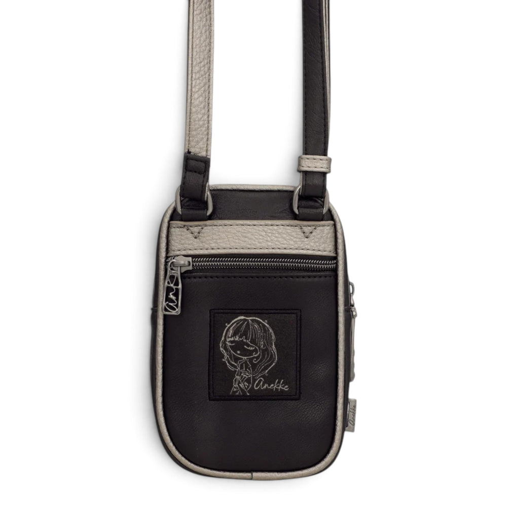 ada-shoes.ro Anekke black crossbody bag with adjustable strap, front zip pocket, and embroidered character detail.