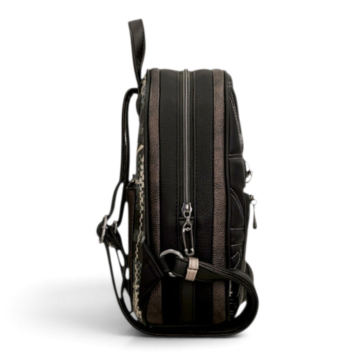 Side view of an Anekke casual backpack in black and brown with decorative stitching and adjustable straps