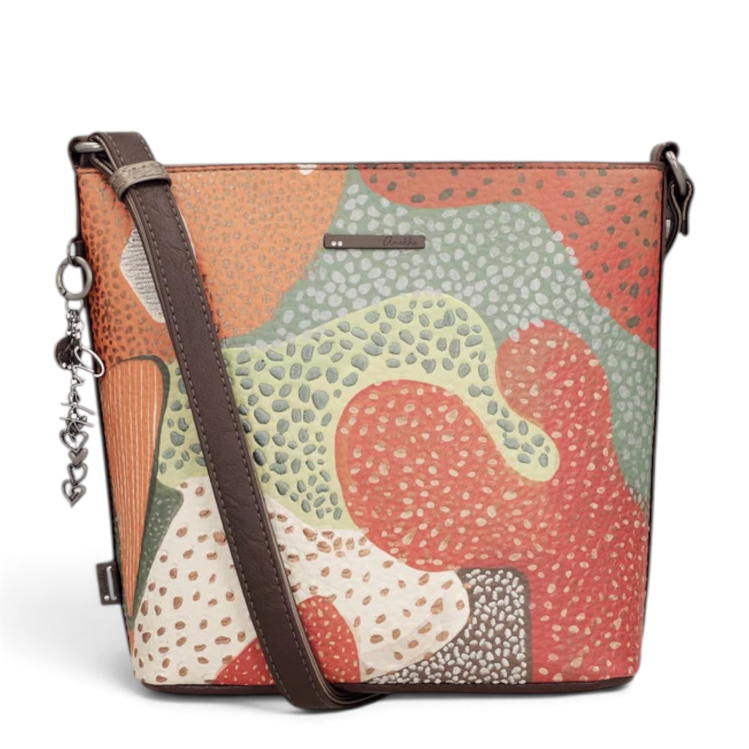 ada-shoes.ro Anekke crossbody bag with a colorful abstract full print pattern, brown strap, and zipper closure.