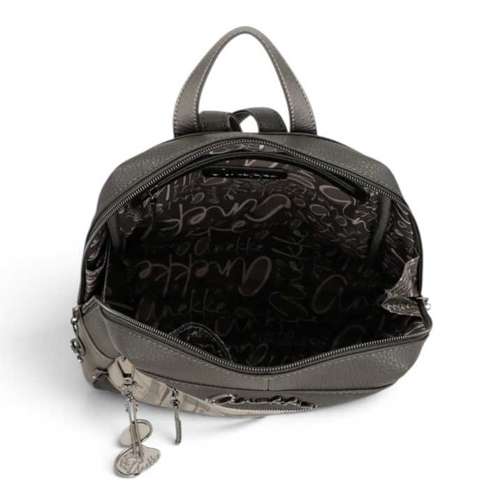ada-shoes.ro Anekke casual backpack in grey with artistic print, open interior, and decorative metal charms.