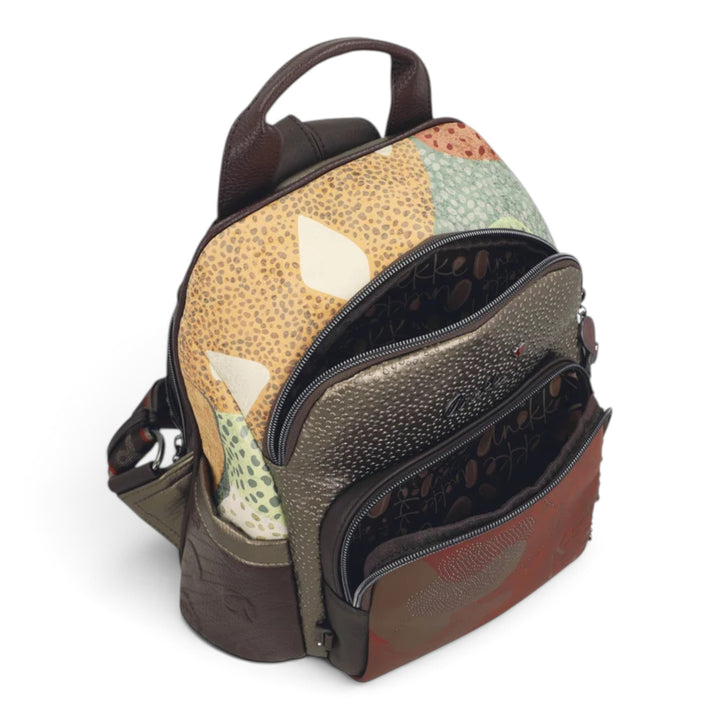 ada-shoes.ro Anekke Odyssey casual backpack with multi-colored patterned panels, front zip pockets, and brown trim.