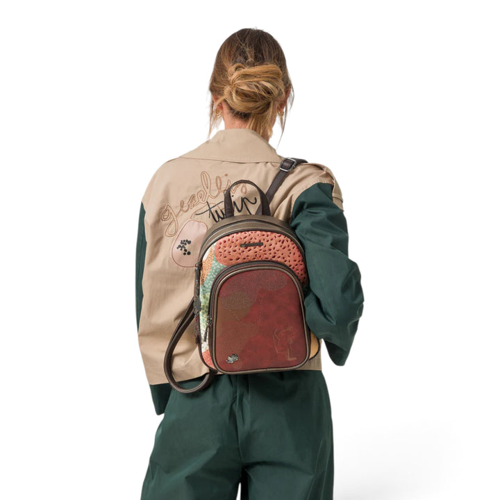 ada-shoes.ro Anekke Odyssey casual backpack with patterned design and adjustable straps worn by a woman