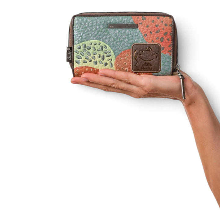 ada-shoes.ro Anekke Odyssey medium rigid wallet with colourful textured PU leather and RFID protection held in hand