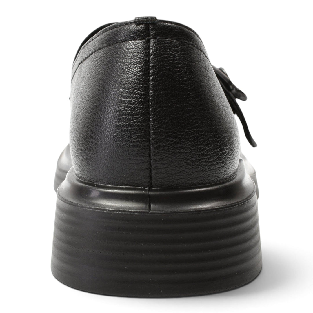 ada-shoes.ro Anna Viotti black casual shoe with a textured leather upper and a thick ribbed platform sole, back view