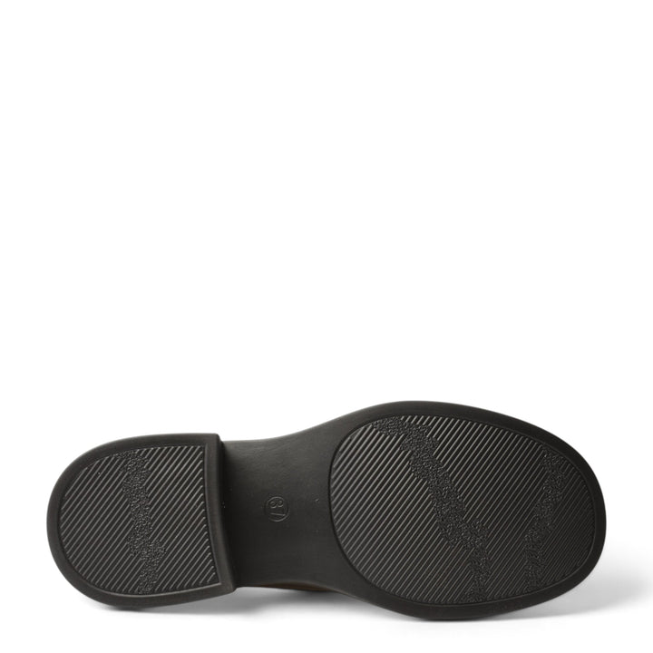 The black rubber sole of an Anna Viotti casual shoe from ada-shoes.ro, featuring a textured anti-slip tread pattern.