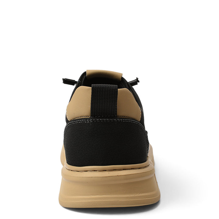 ada-shoes.ro black and beige leather sneakers with a thick flexible sole, rear view showing heel detail