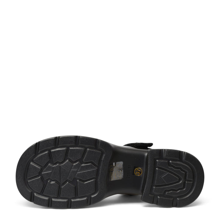Black rubber sole of Pass Collection casual shoes with a textured tread pattern for stability and grip.