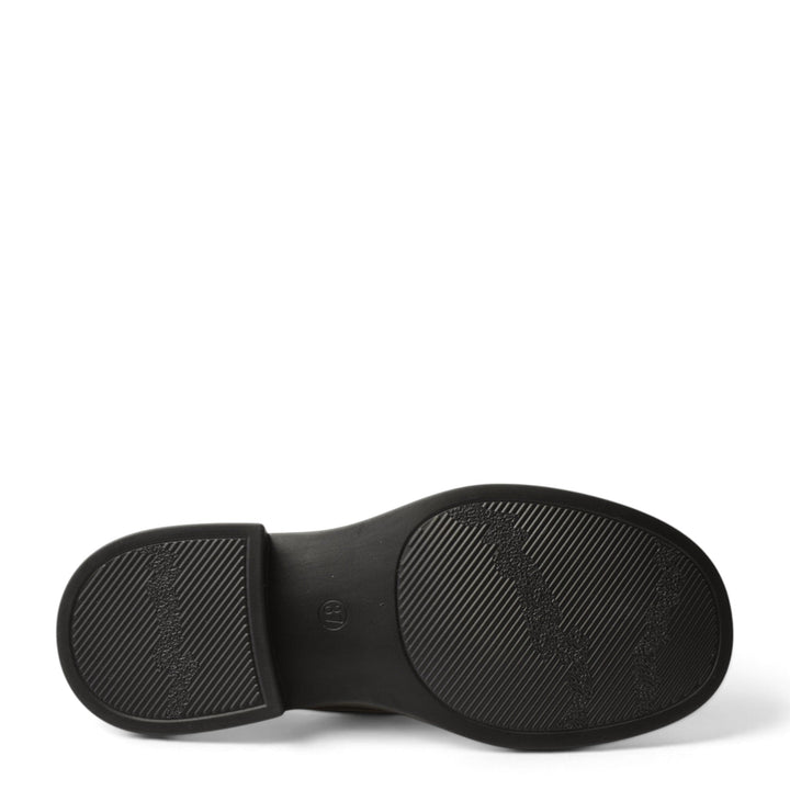 Black rubber sole of an Anna Viotti casual shoe from ada-shoes.ro featuring a textured anti-slip tread pattern