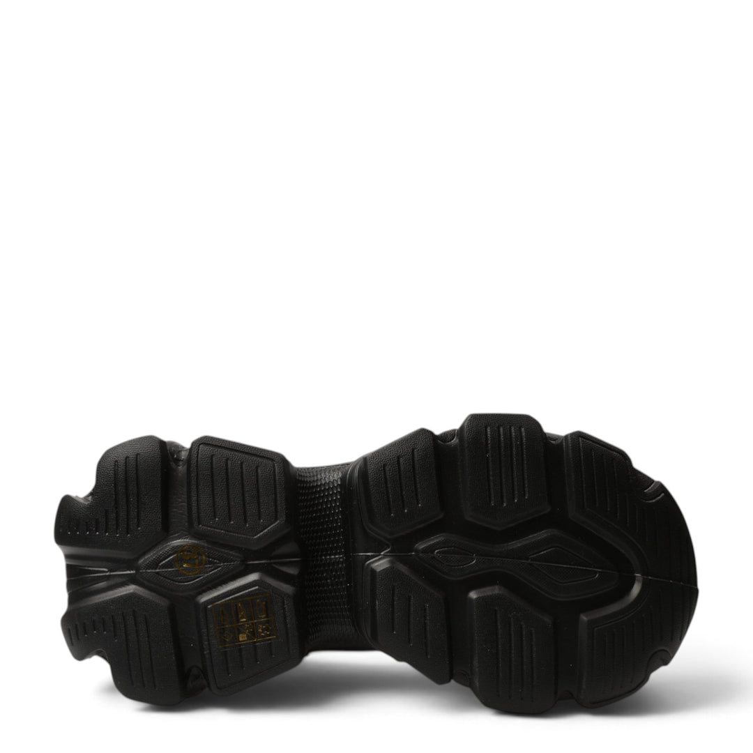 Black chunky rubber sole of Ghete Y5797-N boots from ada-shoes.ro featuring a textured tread pattern