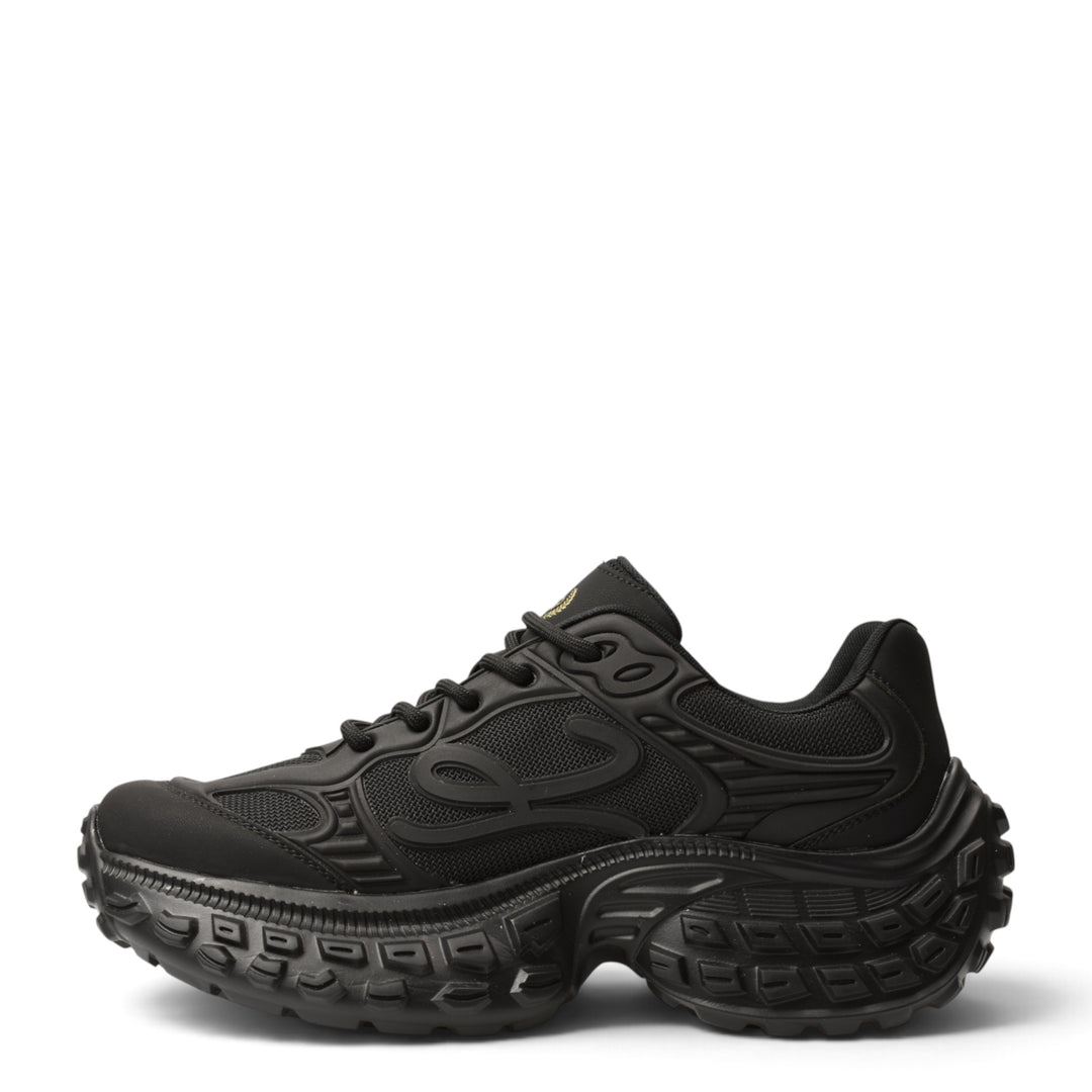 ada-shoes.ro black leather and textile sneakers with a thick, flexible 5cm platform sole and lace-up closure.
