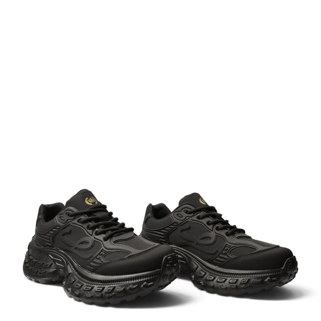 ada-shoes.ro black leather and textile sneakers with a thick, textured 5cm platform sole and lace-up closure.
