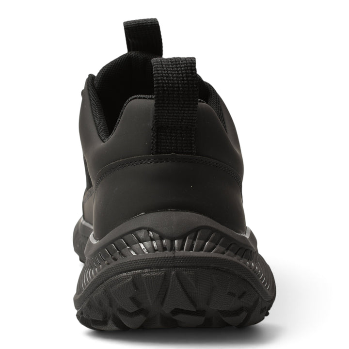 Back view of black ada-shoes.ro sneakers featuring a flexible sole and premium leather and suede construction.