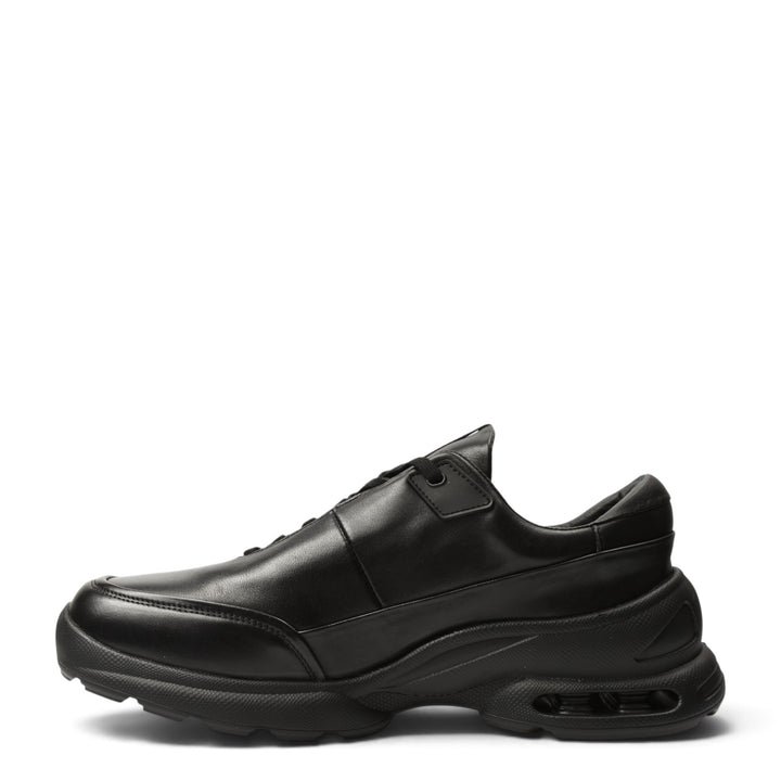 ada-shoes.ro black leather sneakers with a thick, flexible 5cm sole and lace-up closure for casual daily wear.