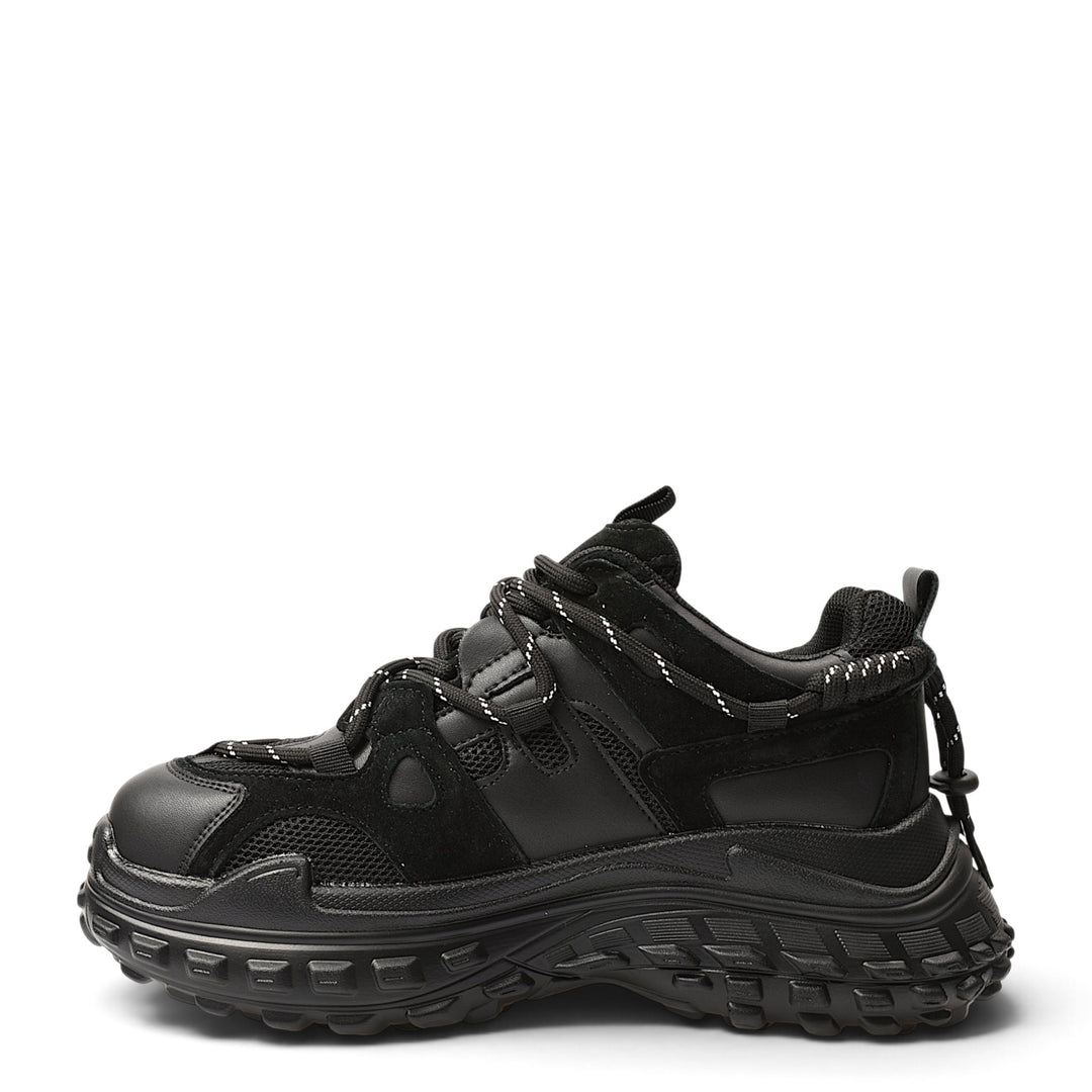 ada-shoes.ro black sneakers featuring a mix of natural leather and suede with a chunky 5cm flexible sole and laces.