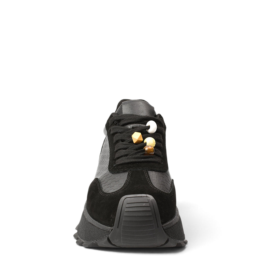ada-shoes.ro black sneakers made of suede and natural leather with a flexible 4.5 cm sole and lace-up closure.