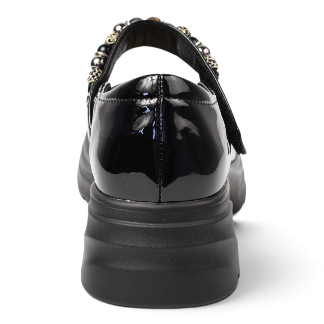 ada-shoes.ro black patent leather casual shoes with a thick platform sole and beaded strap detail, rear view.