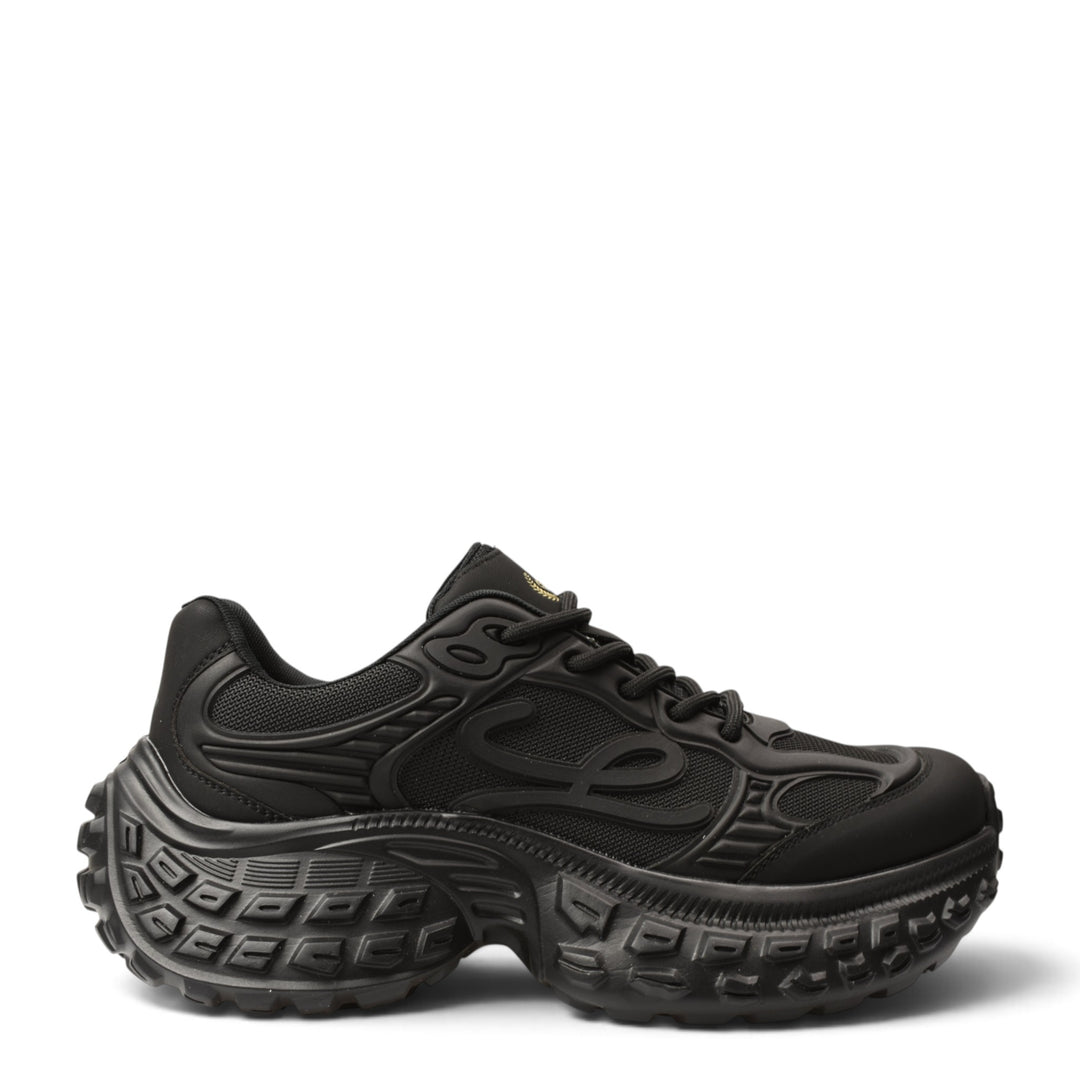 ada-shoes.ro black leather and textile sneakers with a thick, textured platform sole and lace-up closure.