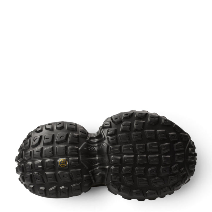 ada-shoes.ro 6050-N black sneaker outsole with a rugged, textured tread pattern for enhanced grip and stability.