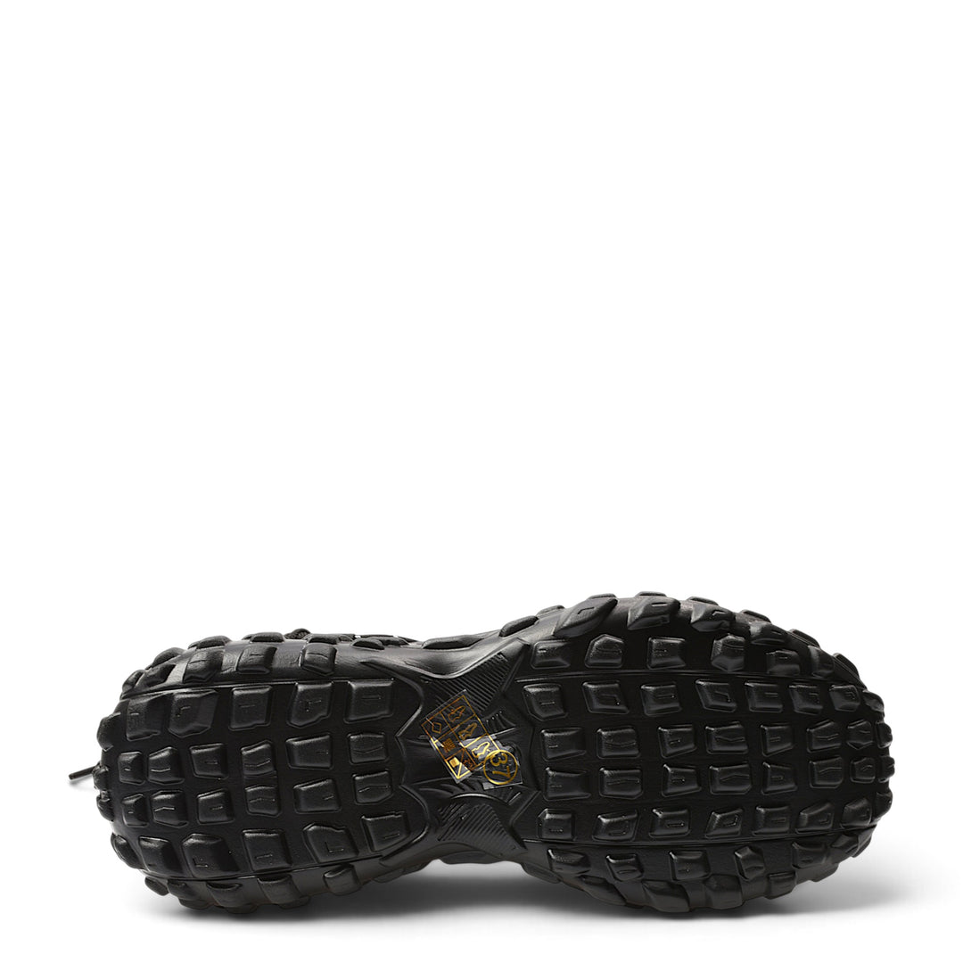 ada-shoes.ro black sneaker outsole with rugged tread pattern for superior grip and traction