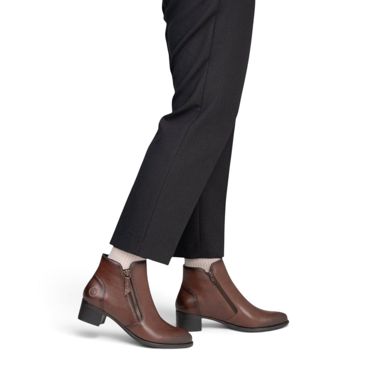 ada-shoes.ro brown leather ankle boots with block heel and side zipper worn with black trousers