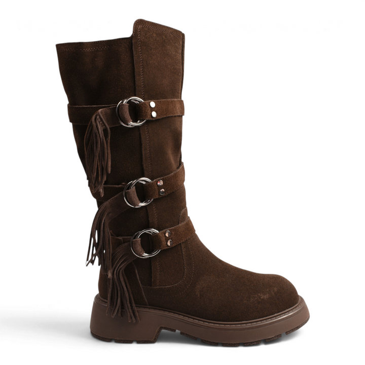 ada-shoes.ro brown suede boots with fringe, metal rings, and a chunky track sole for a boho-chic winter style.