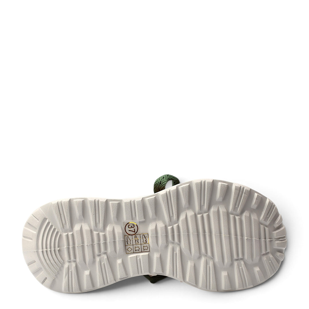 The sole of a green Franco Gerardo sneaker from ada-shoes.ro, showing the textured, flexible white rubber tread pattern.