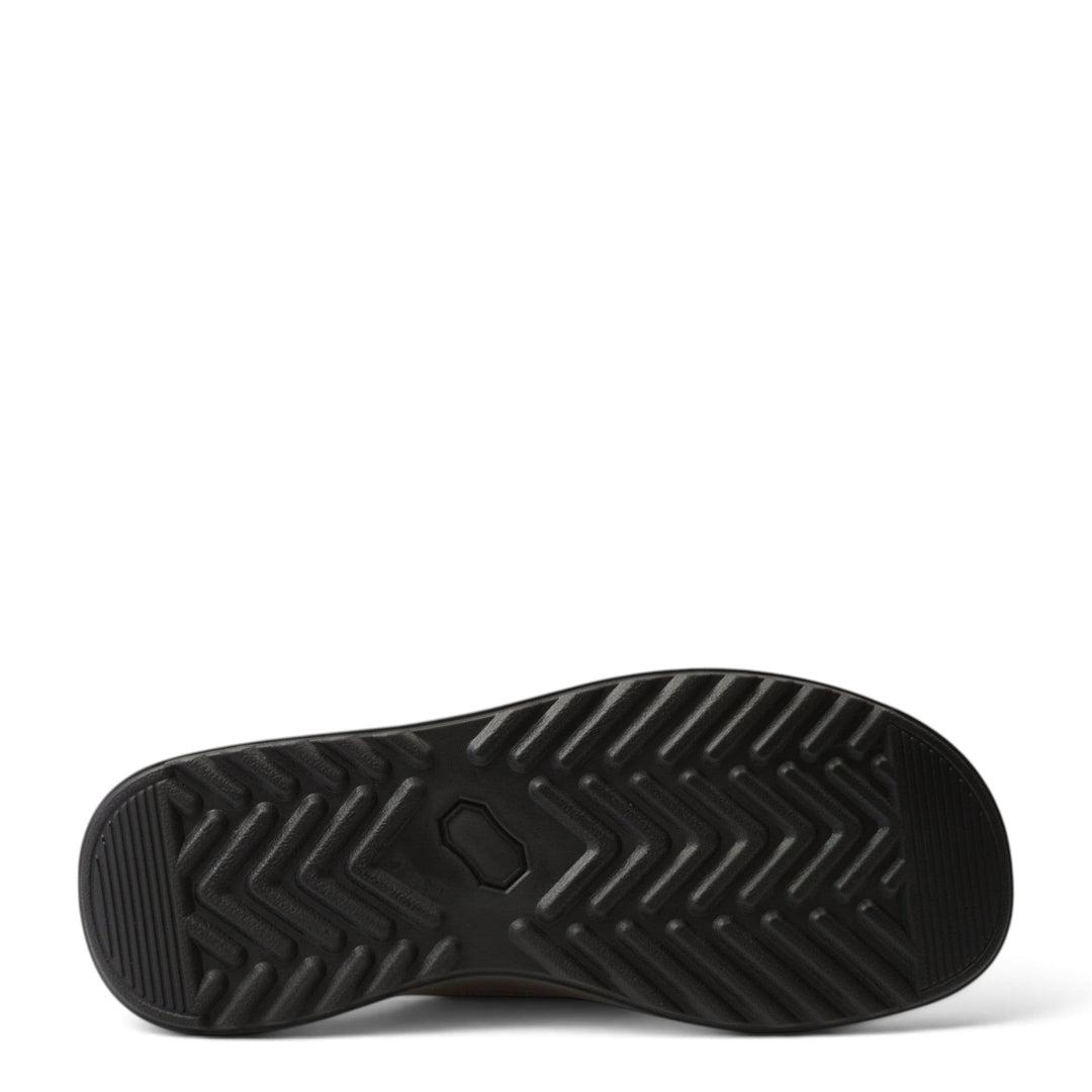 Black rubber sole of Goretti casual shoe from ada-shoes.ro with a textured chevron tread pattern