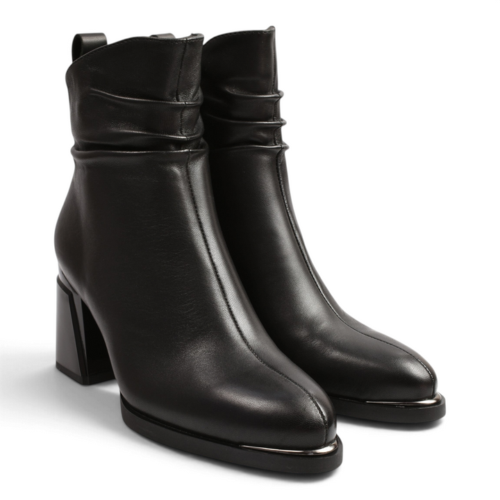 ada-shoes.ro Karisma black leather ankle boots with a draped upper, sculpted block heel, and metallic toe detail.