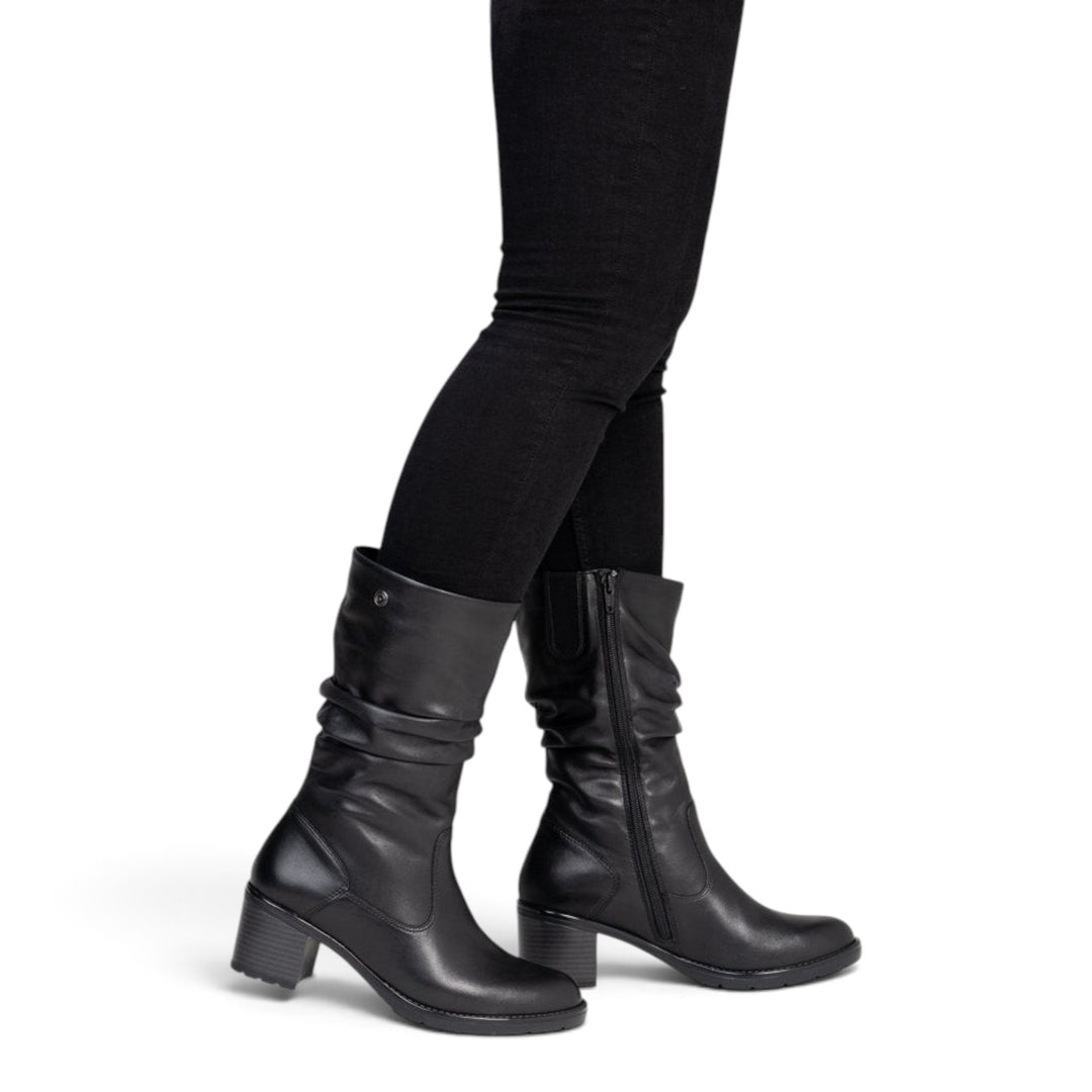 ada-shoes.ro Remonte black leather mid-calf boots with a block heel and side zipper worn by a woman