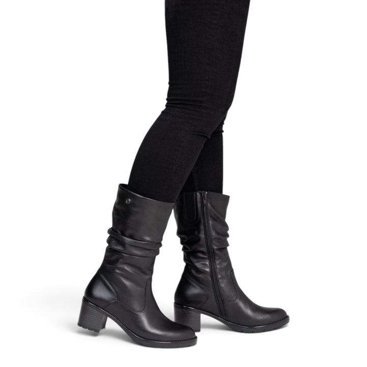 ada-shoes.ro Remonte black leather mid-calf boots with a block heel and side zipper worn by a woman